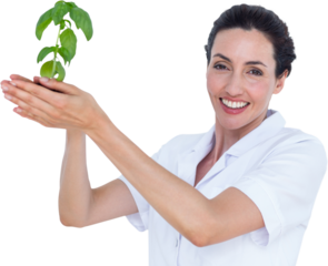 Portrait of scientist holding basil plant