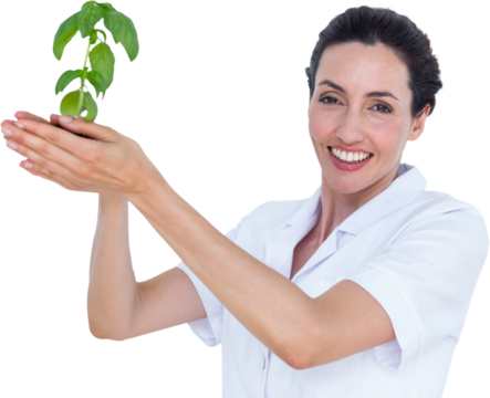 Portrait of scientist holding basil plant - Powered by Adobe
