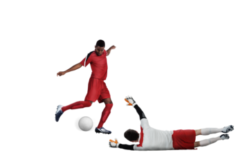 Football players tackling for the ball