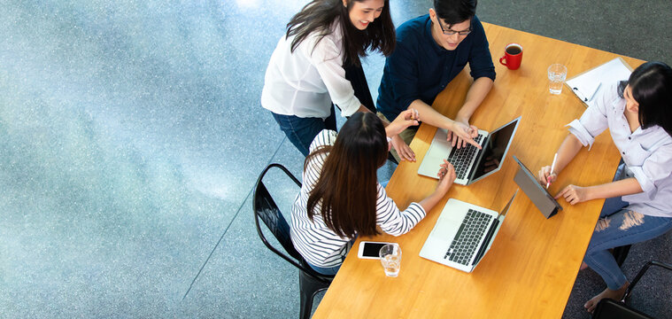 Top view. Group of friends meeting at home. Multiethnic asian business people discussion in corporate meeting at conference room