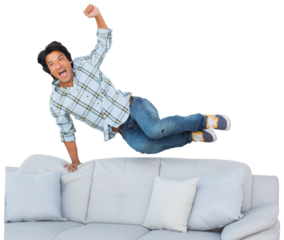 Football fan jumping over the couch