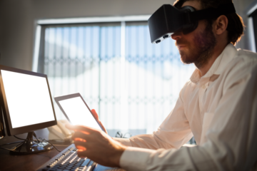 Businessman wearing virtual glasses