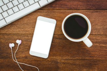 View of a mug of coffee and a smartphone