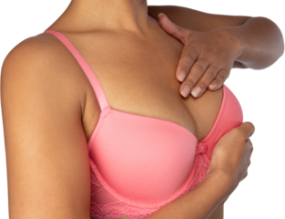 Woman standing for breast cancer awareness against white background