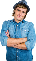 Smiling hipster crossing arms