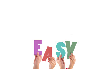 Cropped hands holding colorful word easy 