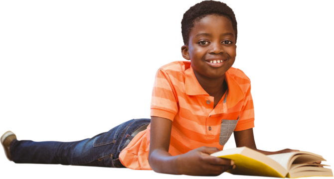 Cute boy reading book in library