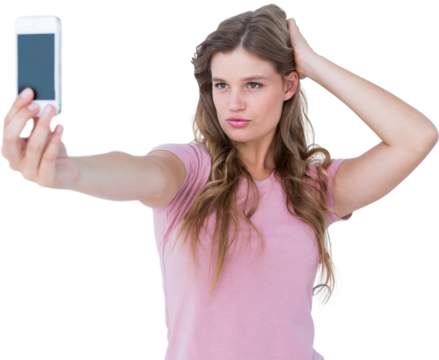 Pretty blonde taking a selfie of herself 