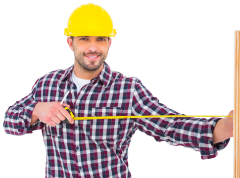 Handyman using measure tape on wooden plank