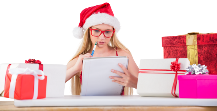 Festive blonde writing her christmas list - Powered by Adobe