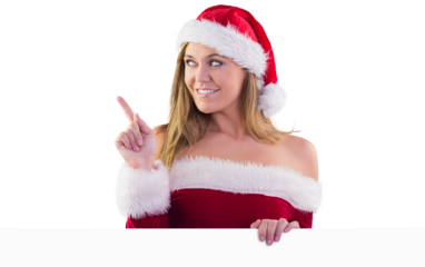 Festive blonde smiling and pointing