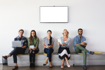 Portrait of smiling business people sitting on seat