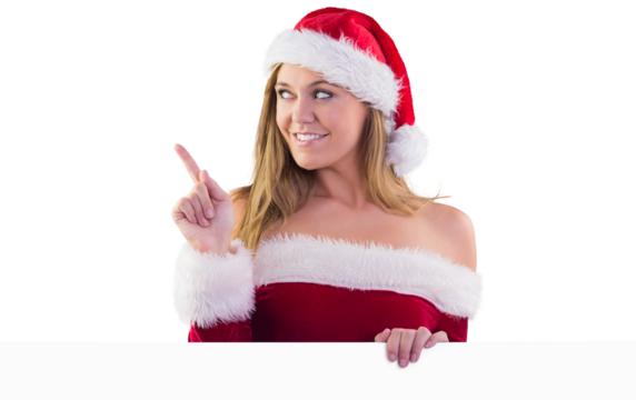 Festive blonde smiling and pointing