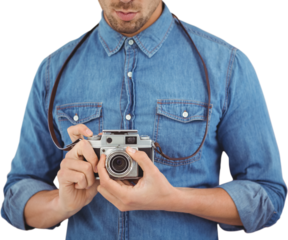 Mid section of man adjusting camera lens