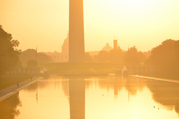 Fototapeta premium Washington Monument and Capitol Building as seen from Lincoln Memorial during sunrise - Washington D.C. United States of America 