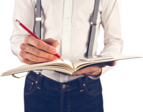 Mid section of man with mobile phone writing on diary - Powered by Adobe