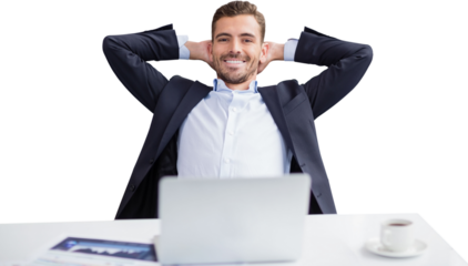 Portrait of smiling businessman with hands behind head sitting against white background