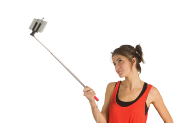 Casual brunette using selfie stick