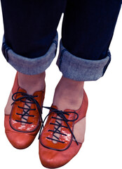 Low section of person wearing brown shoes 