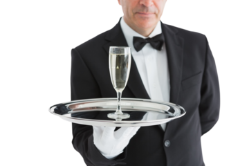 Man in suit serving glass with champagne