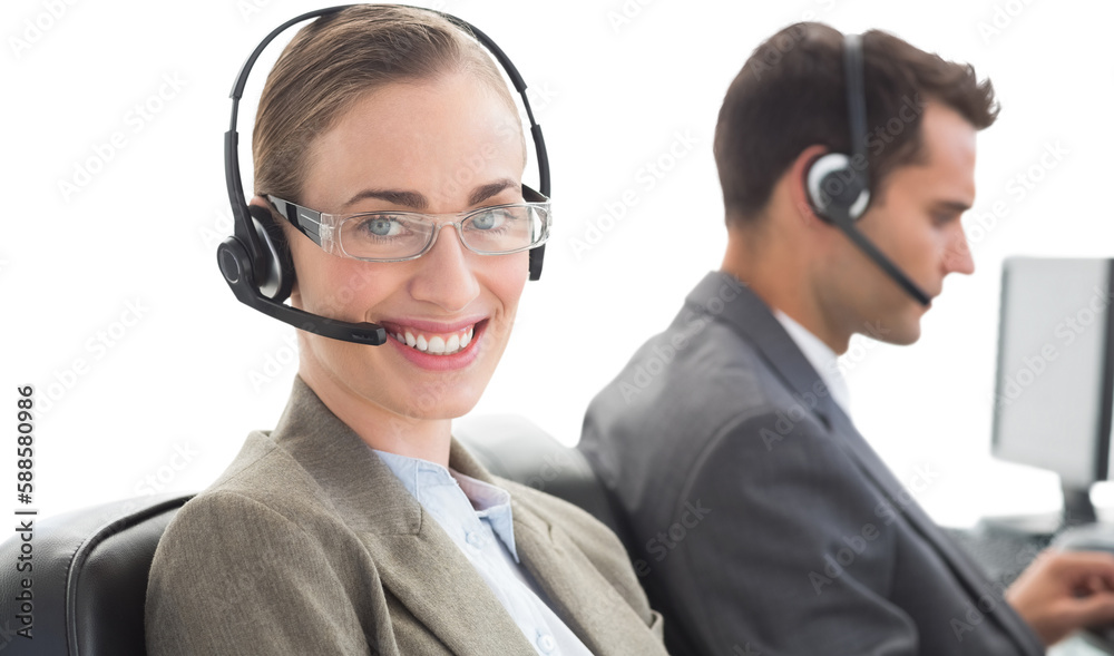 Wall mural Business people with headsets using computers 