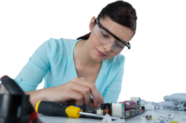 Female engineer repairing computer motherboard