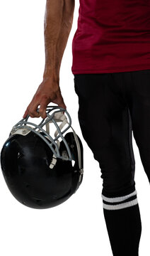 Cropped image of sports player holding helmet