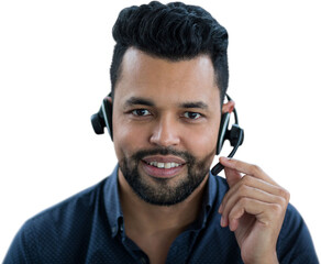 Portrait of smiling male call center agent talking through headset
