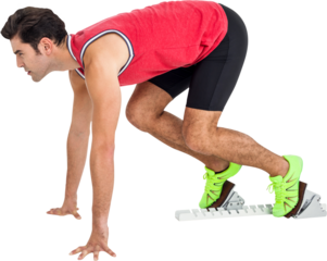 Confident male athlete in ready to run position