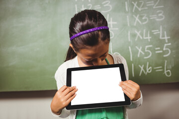 Girl looking at digital tablet