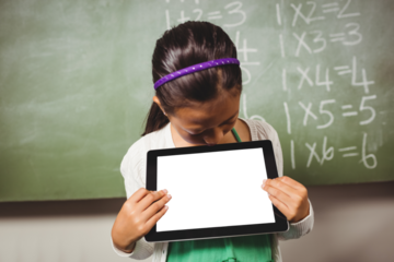 Girl looking at digital tablet
