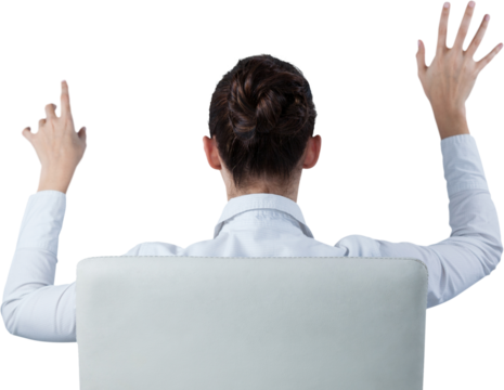 Rear view of businesswoman using digital screen