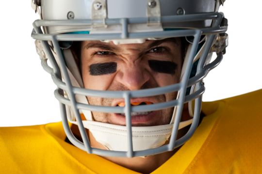 Portrait of aggressive American football player wearing helmet