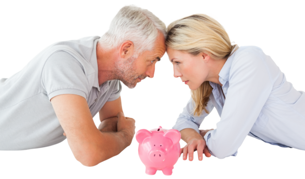 Side view of couple lying down with touching heads by piggy bank