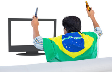 Football fan holding beer and watching television
