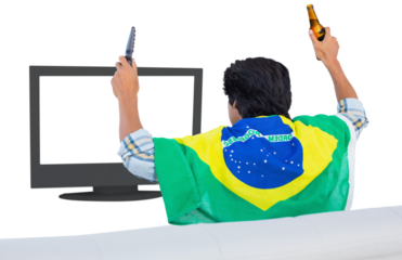 Football fan holding beer and watching television