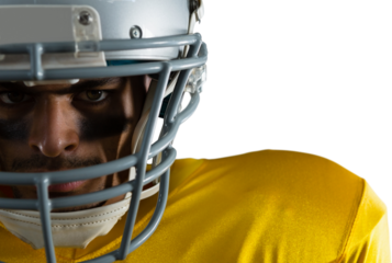 Close up portrait of American football player wearing helmet