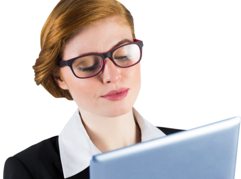 Redhead businesswoman using her tablet pc