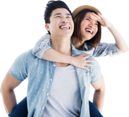 Young man giving piggyback ride to woman