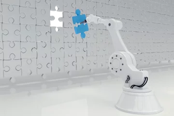 Poster Robotic hand putting blue jigsaw piece on puzzle © vectorfusionart