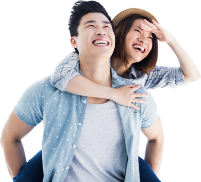 Young man giving piggyback ride to woman