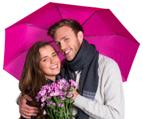 Cheerful young couple with flowers and umbrella