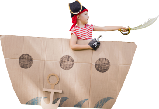 Boy with cardboard artificial ship