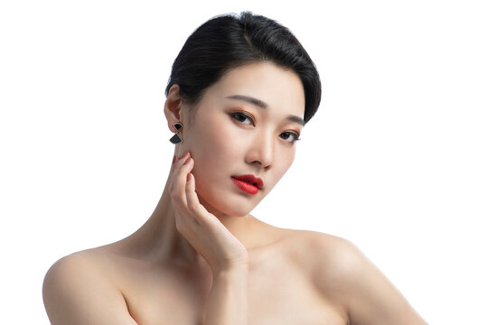 Studio shot of young beautiful Chinese woman