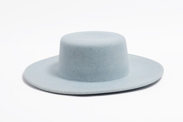 Felt stilish summer blue hat for women, isolated white background.