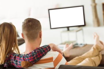 Cute couple relaxing on couch