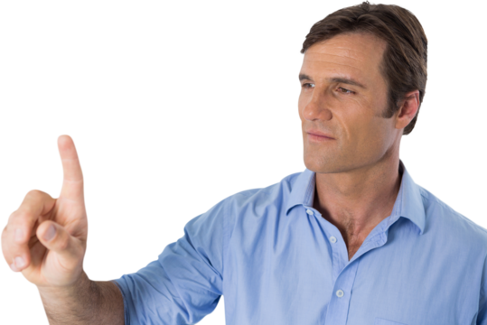 Male executive pressing an invisible virtual screen