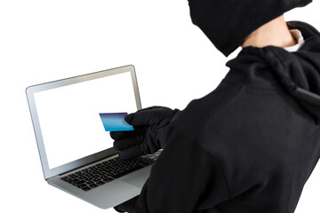 Mid section of female hacker using laptop and credit card