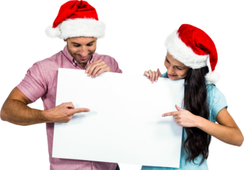 Festive couple showing sign