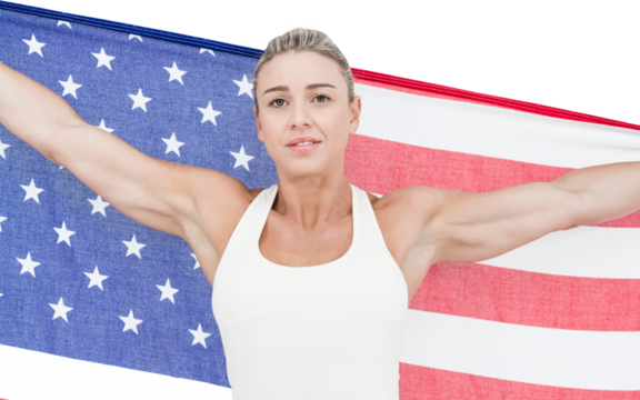 Female athlete holding American flag